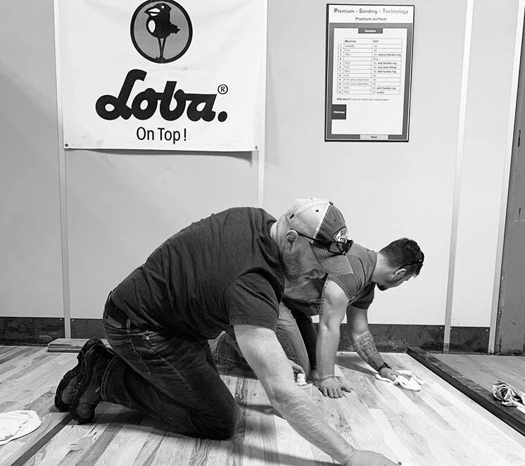 Costal Plains Flooring employees working on floors